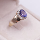 Vintage Gänseblümchenring aus 14-karätigem Gelbgold mit Tansanit (2.70 ct) und Diamanten (0.40 ctw)