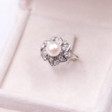 Vintage 18k White Gold Pearl and Diamond Flower Ring (0.27ctw), 60s