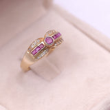 Anello vintage in oro giallo 14k con rubini e diamanti (0,08ctw)