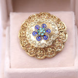 Spilla in oro giallo 18k con smalti e turchesi, anni '50