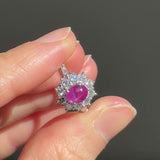 Anello a margherita vintage in platino con rubino stellato (1.35ct) e diamanti (0.66ctw ca.), anni ‘90