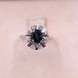 Anello vintage a margherita in oro bianco 14k con zaffiro (1ct) e diamanti (0,24ctw)
