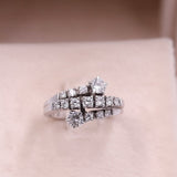 Anel vintage estilo contrarier em ouro branco 18k com diamantes (1 ct no total), década de 70.