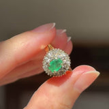 Anello ballerina vintage in oro giallo 14K con smeraldo (0.50ct ca.) e diamanti di taglio brillante e di taglio tapered (0.50ctw ca.), anni ‘70