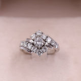 Anello vintage in oro bianco 14k con diamante centrale di 0,45ct e diamanti di contorno (1,20ctw), anni '70