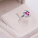 ANELLO VINTAGE A MARGHERITA IN PLATINO 850 CON RUBINO NATURALE (1CT) E DIAMANTI (0.85CT)