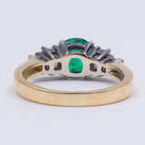 Vintage 18k gold ring with central emerald and old cut diamonds (0.50ct), 1940s
