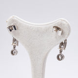 Boucles d'oreilles vintage en platine avec diamants pour un total d'environ 1 ct, années 60