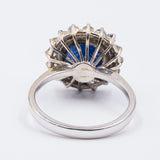 Vintage 18K gold ring with central cabochon sapphire and diamonds, 60s
