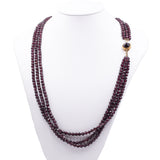 Vintage three strand necklace with garnets and susta in 18k yellow gold, 50s