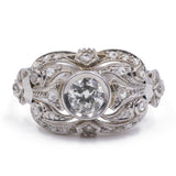 Art Decò-Ring aus 18 Karat Weißgold mit einem zentralen Diamanten von 0.40 Karat und einem Diamantumriss