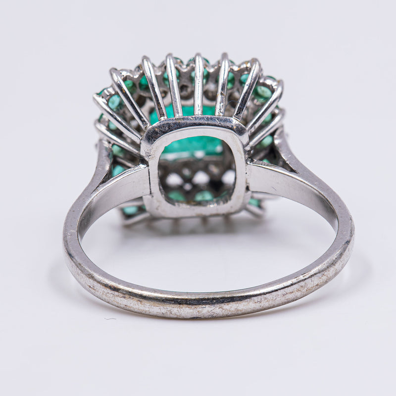 Vintage white gold ring with emeralds and diamonds (0.28ct), 1960s
