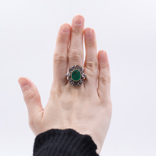 Antique gold and silver ring with emerald and rose cut diamonds, early 1900s