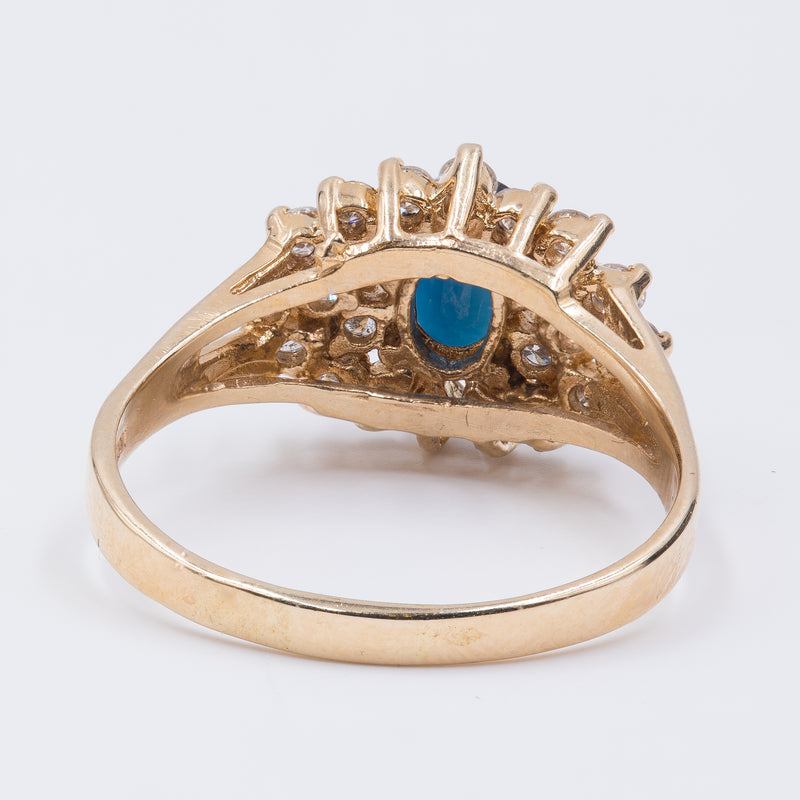 Anello in oro 14k con zaffiro centrale e diamanti , anni 70