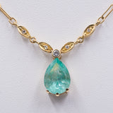 Vintage necklace in 18k yellow gold with emerald drop and diamonds, 80s