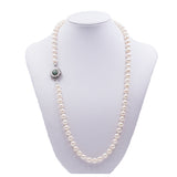 Collier de perles vintage avec susta en or blanc 18 carats avec émeraudes. Années 60