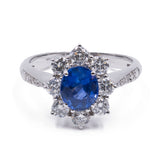 MODERN DAISY RING IN 18K WHITE GOLD WITH CENTRAL PAILIN SAPPHIRE (1.32CT) AND BRILLIANT-CUT DIAMONDS (0.84CTW)