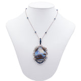 VINTAGE PENDANT IN 18K WHITE GOLD WITH OPAL BOULDER, DIAMONDS AND SAPPHIRES. WHITE GOLD CHAIN WITH OPALS. 40S