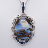 VINTAGE PENDANT IN 18K WHITE GOLD WITH OPAL BOULDER, DIAMONDS AND SAPPHIRES. WHITE GOLD CHAIN WITH OPALS. 40S