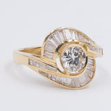 Vintage 18k yellow gold ring with central diamond (0.70ct) and diamonds in the outline (2ct), 70s