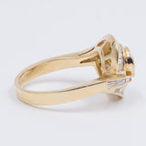 Vintage 18k yellow gold ring with central diamond (0.70ct) and diamonds in the outline (2ct), 70s