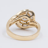 Vintage 18k yellow gold ring with central diamond (0.70ct) and diamonds in the outline (2ct), 70s