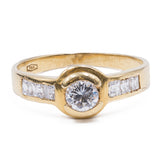 Bague vintage en or 18 carats avec diamant central (0,30 ct) et diamants latéraux, 1960