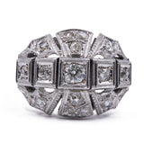 Art Decò ring in 18k gold with old cut diamonds (0.60ct) and rosettes, 30s