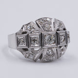 Art Decò ring in 18k gold with old cut diamonds (0.60ct) and rosettes, 30s