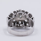 Art Decò ring in 18k gold with old cut diamonds (0.60ct) and rosettes, 30s