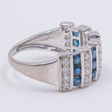 Vintage Ring aus 18 Karat Weißgold mit Diamanten (ca. 0.24 Karat) und blauem Topas, 90er Jahre