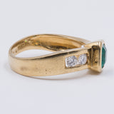 Ring aus 18 Karat Gold mit Smaragd und Diamanten (ca. 0.40 ctw.), 80er Jahre