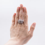 Art Decò ring in 18k gold with old cut diamonds (0.60ct) and rosettes, 30s