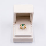 Vintage 18k yellow gold ring with emerald (0.90ct) and two diamonds (0.24ctw), 70s