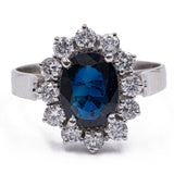 Vintage 18K white gold daisy ring with sapphire (1.60ct approx.) And brilliant cut diamonds (0.60ctw approx.)