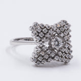 Vintage 18k white gold ring with brilliant cut diamond (0.20 ct) and 52 huit-huit cut