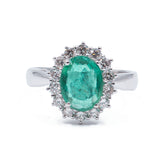 18k gold ring with emerald (1.6 ct) and brilliant cut diamonds outline (0.55 ct)