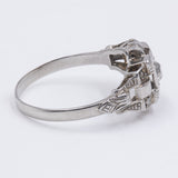 Art Decò Ring aus Platin mit einem alten Minenschliff Diamanten (0,20 ct) und Rosetten, 30er