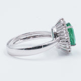 18k gold ring with emerald (1.6 ct) and brilliant cut diamonds outline (0.55 ct)