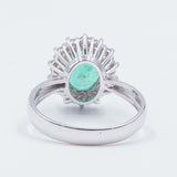 18k gold ring with emerald (1.6 ct) and brilliant cut diamonds outline (0.55 ct)