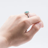 18k gold ring with emerald (1.6 ct) and brilliant cut diamonds outline (0.55 ct)