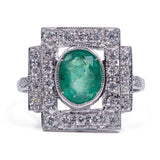 18k white gold ring with central emerald (1.30 ct) and brilliant cut diamonds (0.48 ctw)