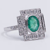 18k white gold ring with central emerald (1.30 ct) and brilliant cut diamonds (0.48 ctw)