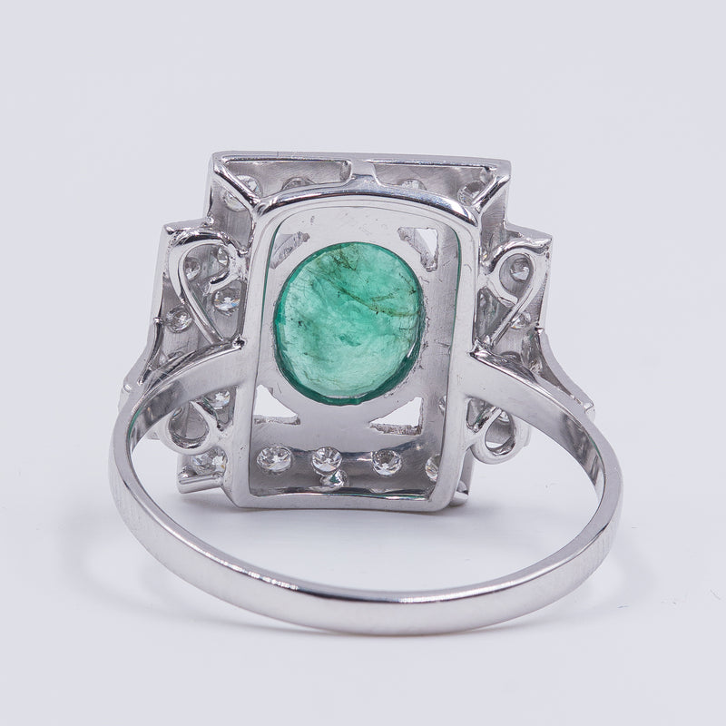 18k white gold ring with central emerald (1.30 ct) and brilliant cut diamonds (0.48 ctw)