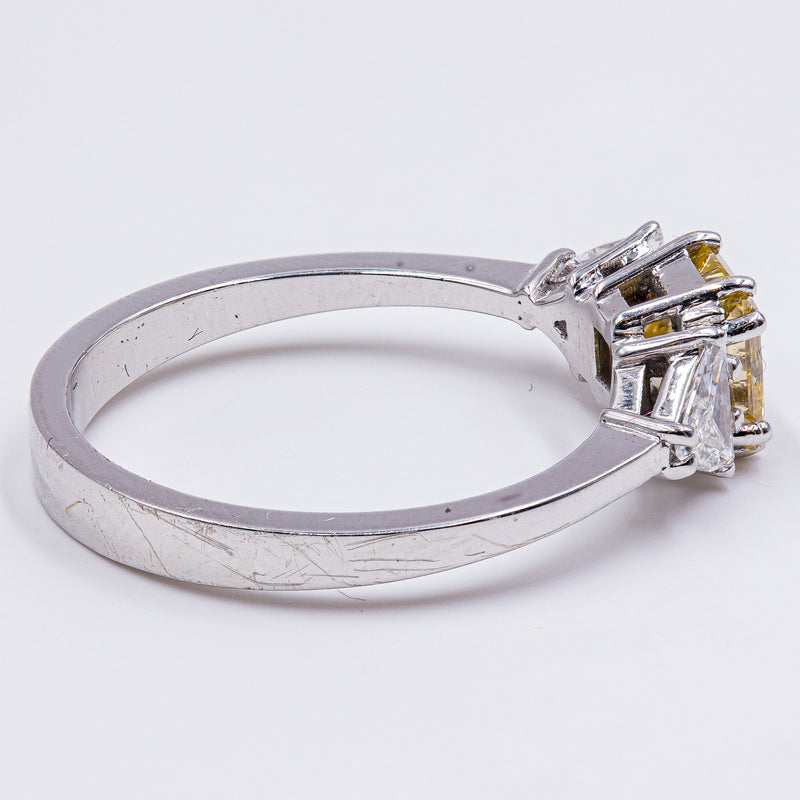 18k white gold ring with fancy yellow diamond (1ct) and triangular side diamonds (0.60ctw)