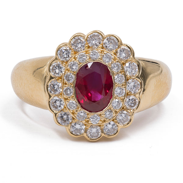 Vintage 18k yellow gold ring with central ruby (1.2ct) and brilliant cut diamonds (0.90ctw), 1960s