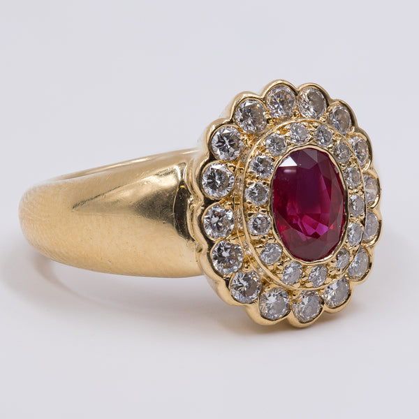 Vintage 18k yellow gold ring with central ruby (1.2ct) and brilliant cut diamonds (0.90ctw), 1960s