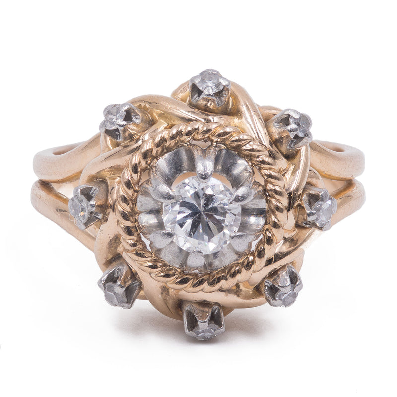 18k two-tone gold ring with central brilliant cut diamond (0.28 ct), 1930s