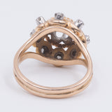 Двухцветное золотое кольцо 18 карат с центральным бриллиантом классической огранки (0.28 карата), 30-е годы