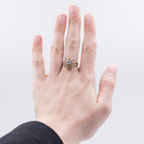 18k two-tone gold ring with central brilliant cut diamond (0.28 ct), 30s